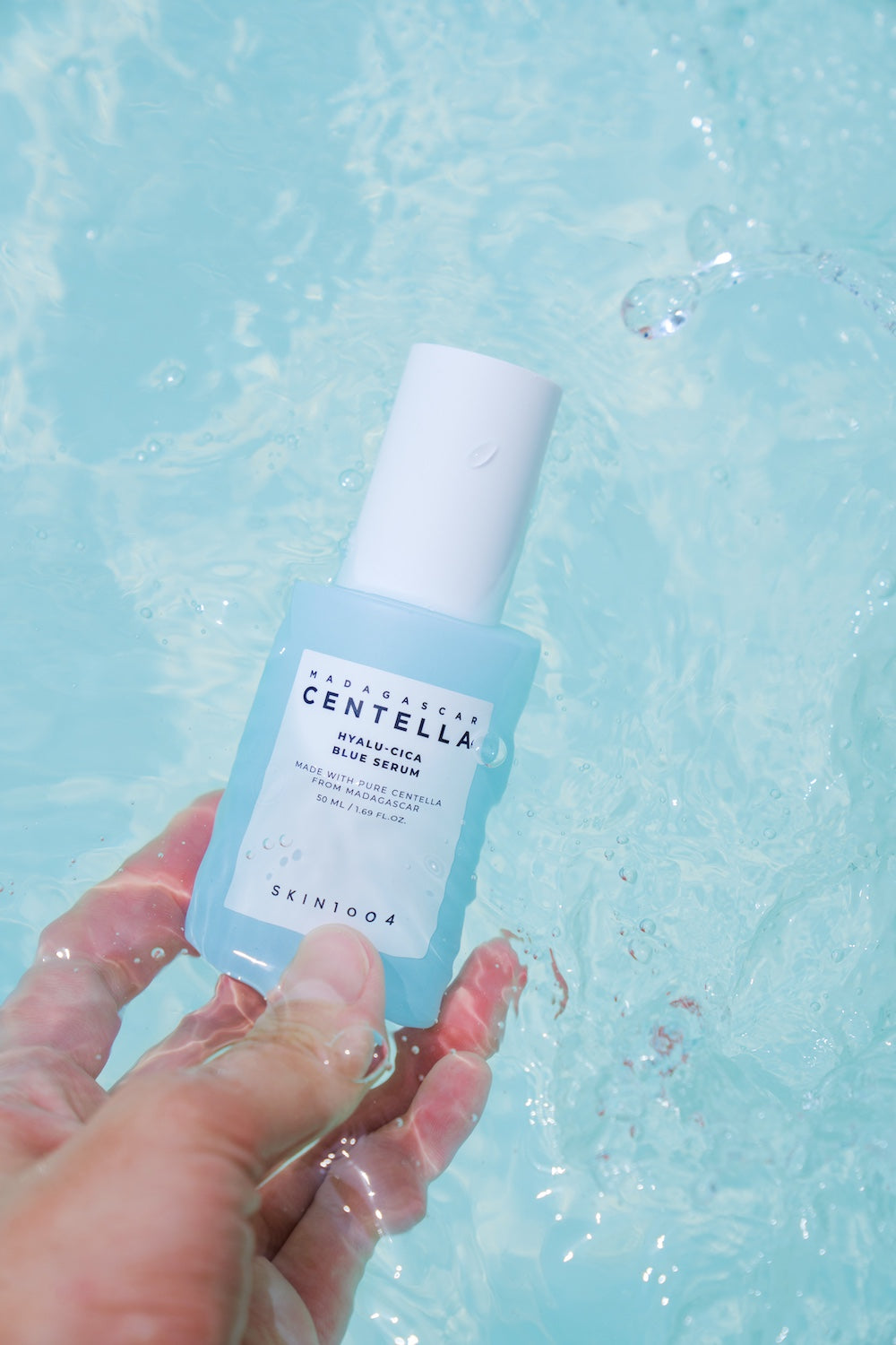 SKIN1004 Madagascar Centella Hyalu-Cica Blue Serum 50ml facial serum bottle on a white background